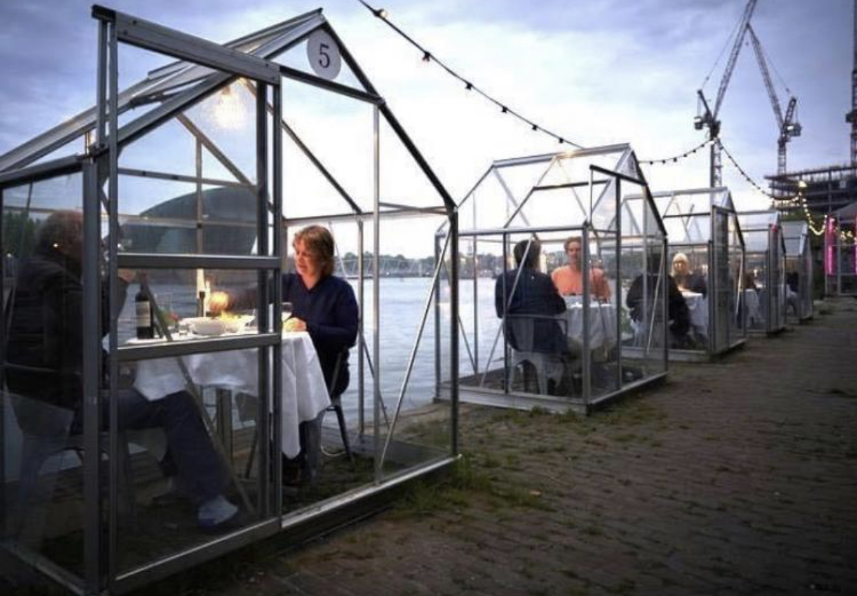 Couples dining in greenhouses COVID19. A new normal response to COVID19 Couples dining in greenhouses. A new normal response to COVID19